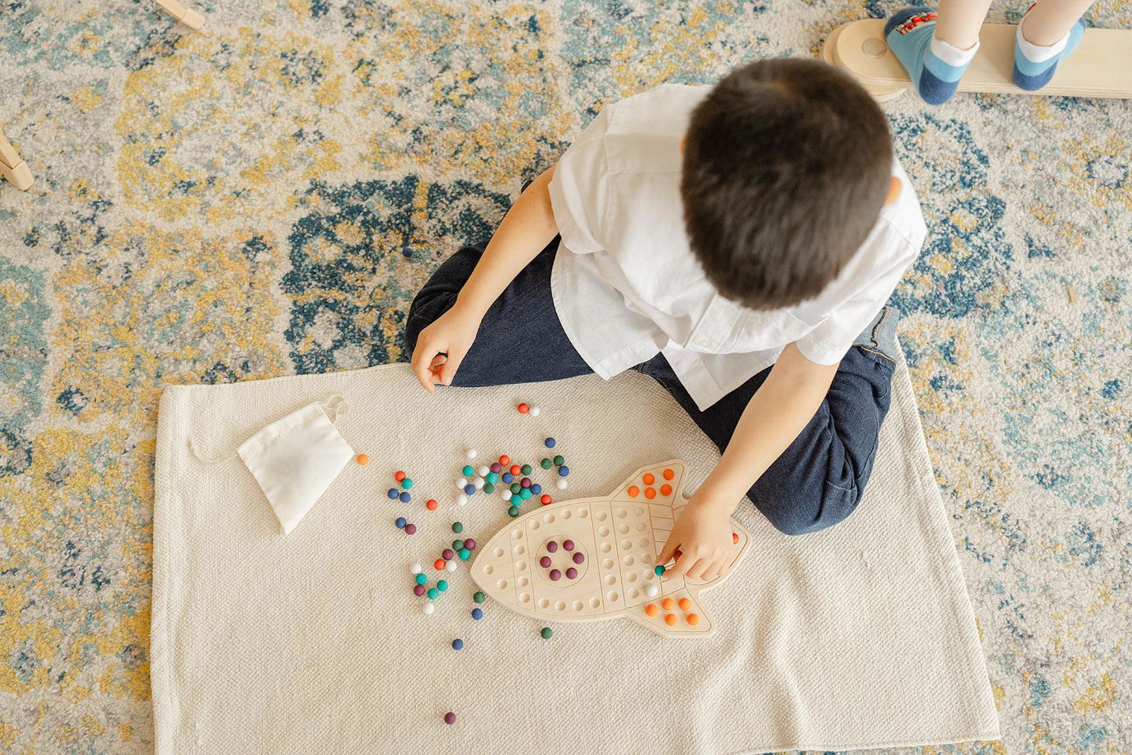 The Rocketship Activity Board - Natural CuteNest